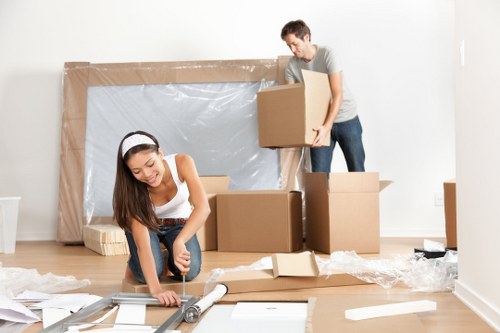 Removal team planning a move in a New Cross residential street