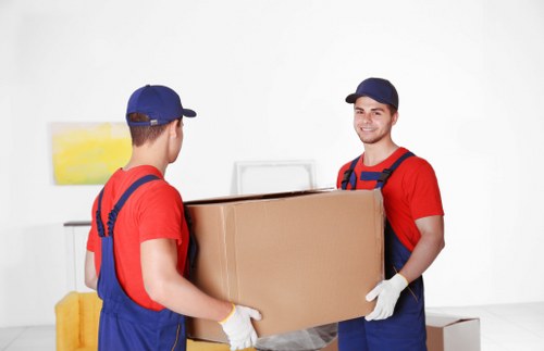 Removal team helping with a residential move in New Cross