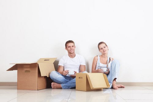 Local removals team handling equipment in New Cross