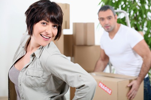 Packing and loading items into a moving truck in New Cross