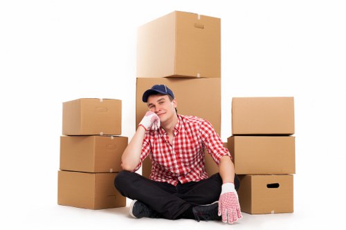 Removal team loading boxes and household items for a New Cross relocation