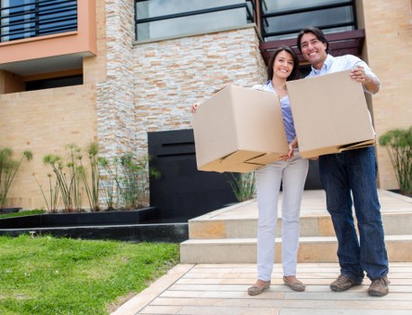 Preparation checklist and packed household items for a New Cross move